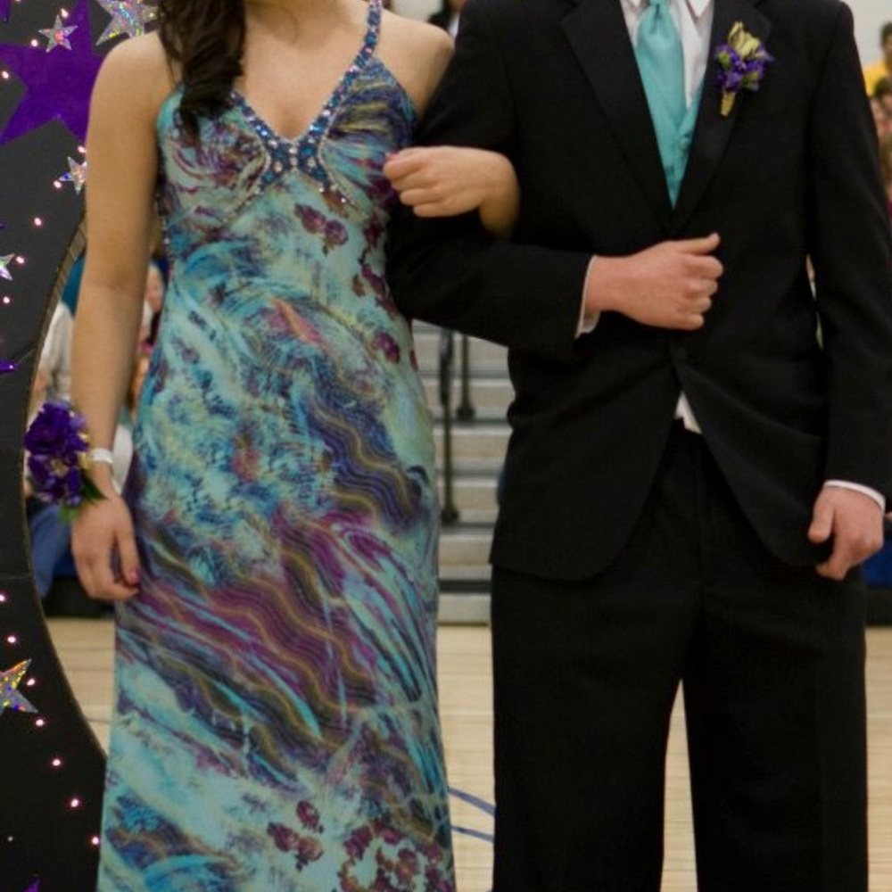 Prom Dress. Open back with ruffled train.